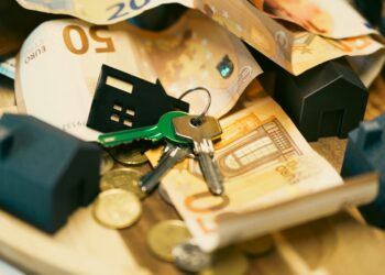 House keys euro banknotes coins, real estate financial