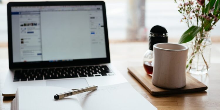 Laptop and notepad