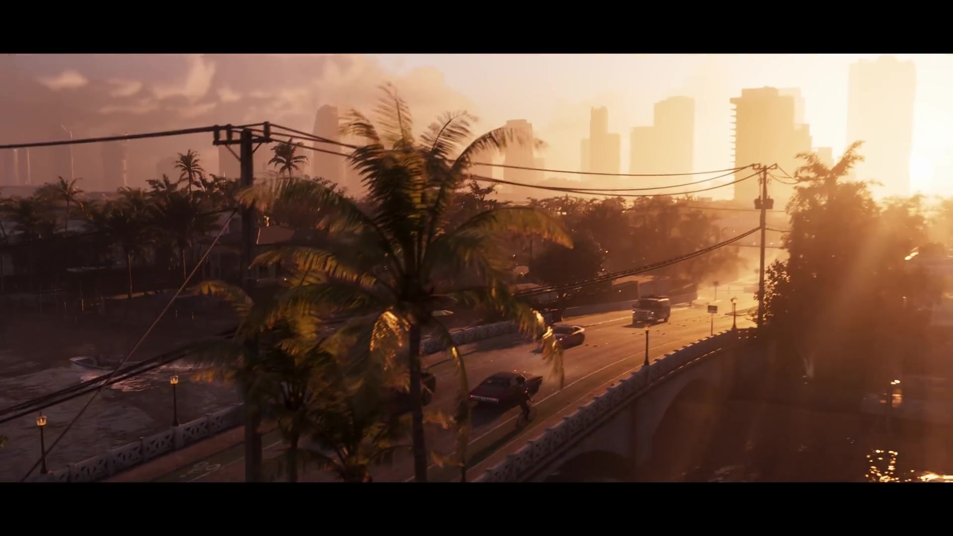 Zonsondergang boven Vice City met palmbomen en een brug in de trailer van GTA 6