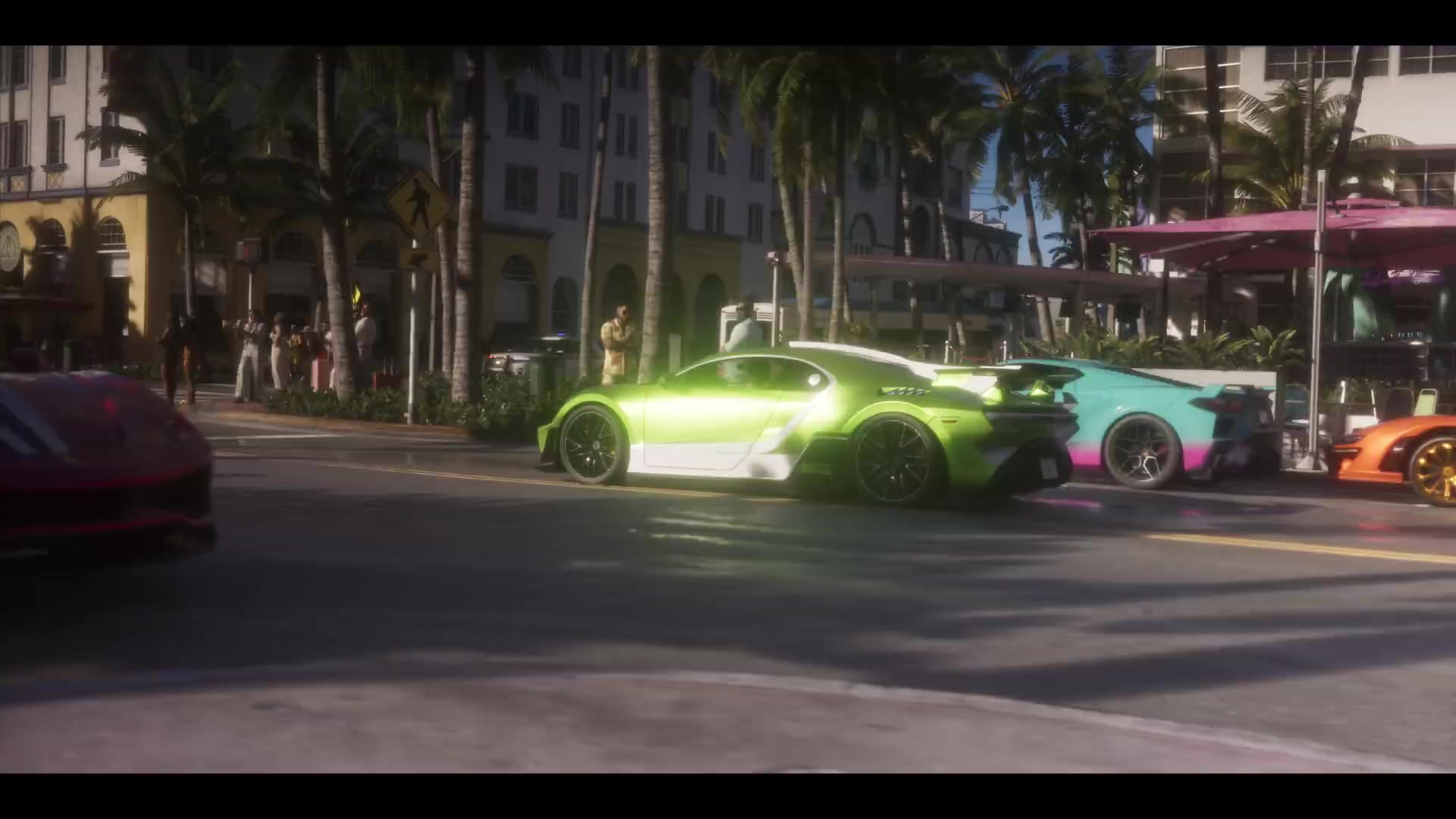 Supercars in een zonnige straat in Vice City, still uit de launch trailer van GTA 6